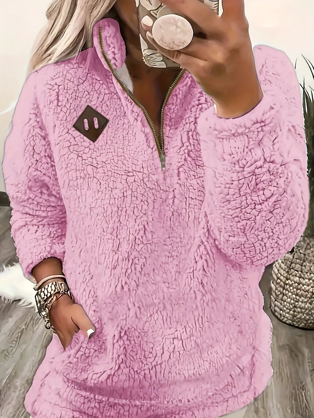Women's pink sherpa half-zip pullover with stand collar