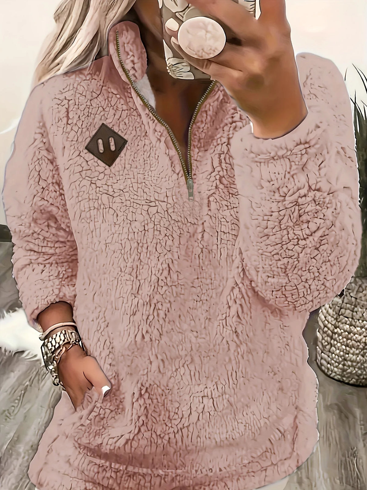 Women's pink sherpa half-zip pullover with stand collar