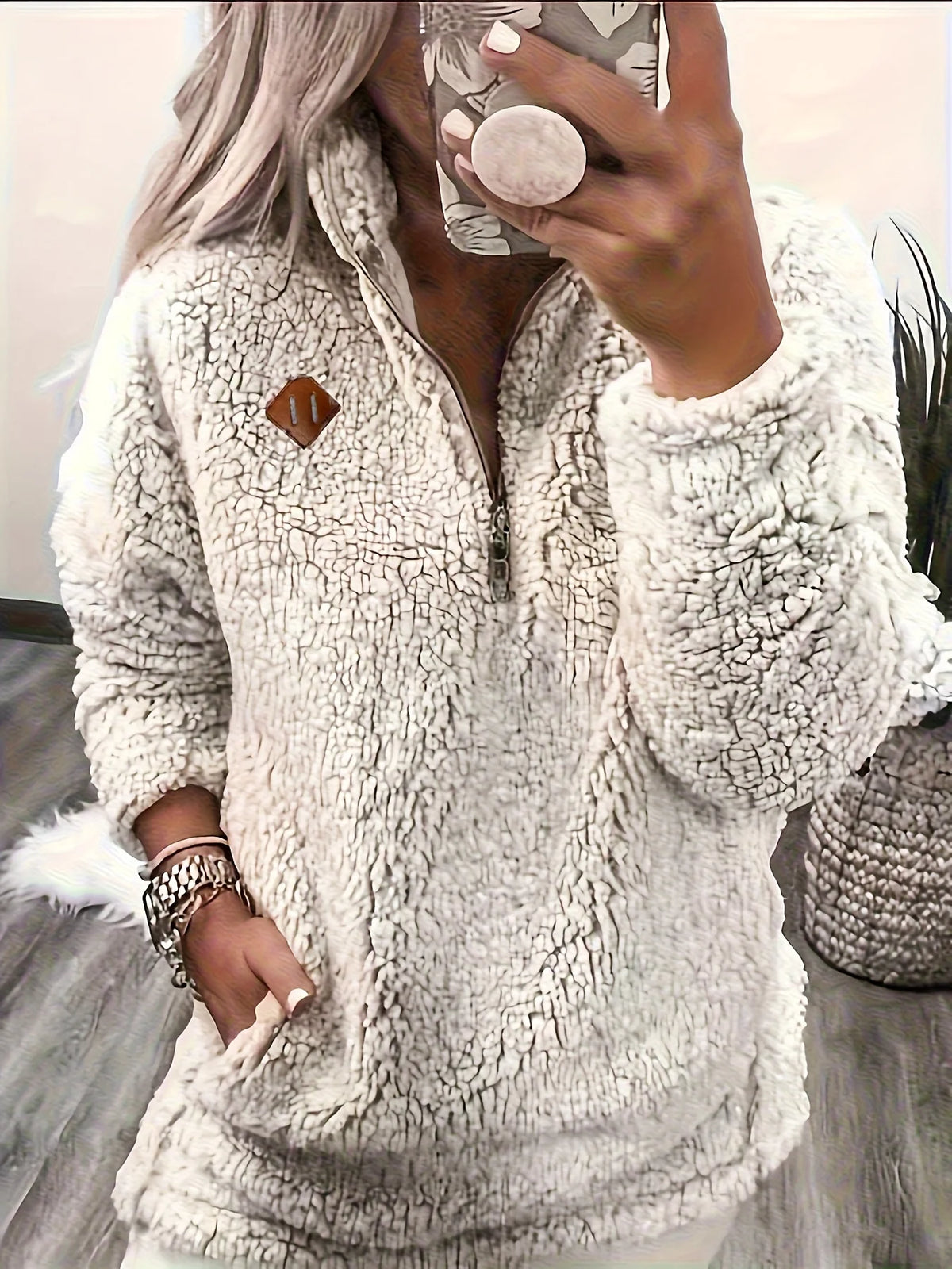 Women's ivory sherpa half-zip pullover fabric detail
