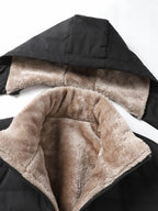 Men's black winter coat, close-up of quilted chest panel