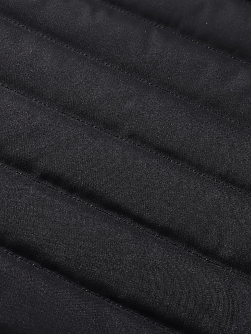 Men's black winter coat, close-up of sherpa lining texture