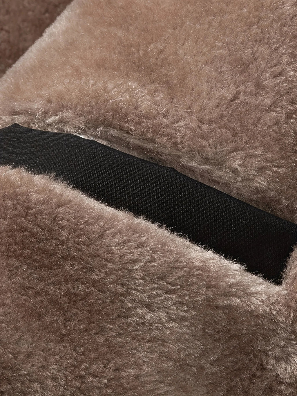Men's black sherpa-lined hooded winter coat, collar open