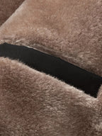 Men's black sherpa-lined hooded winter coat, collar open