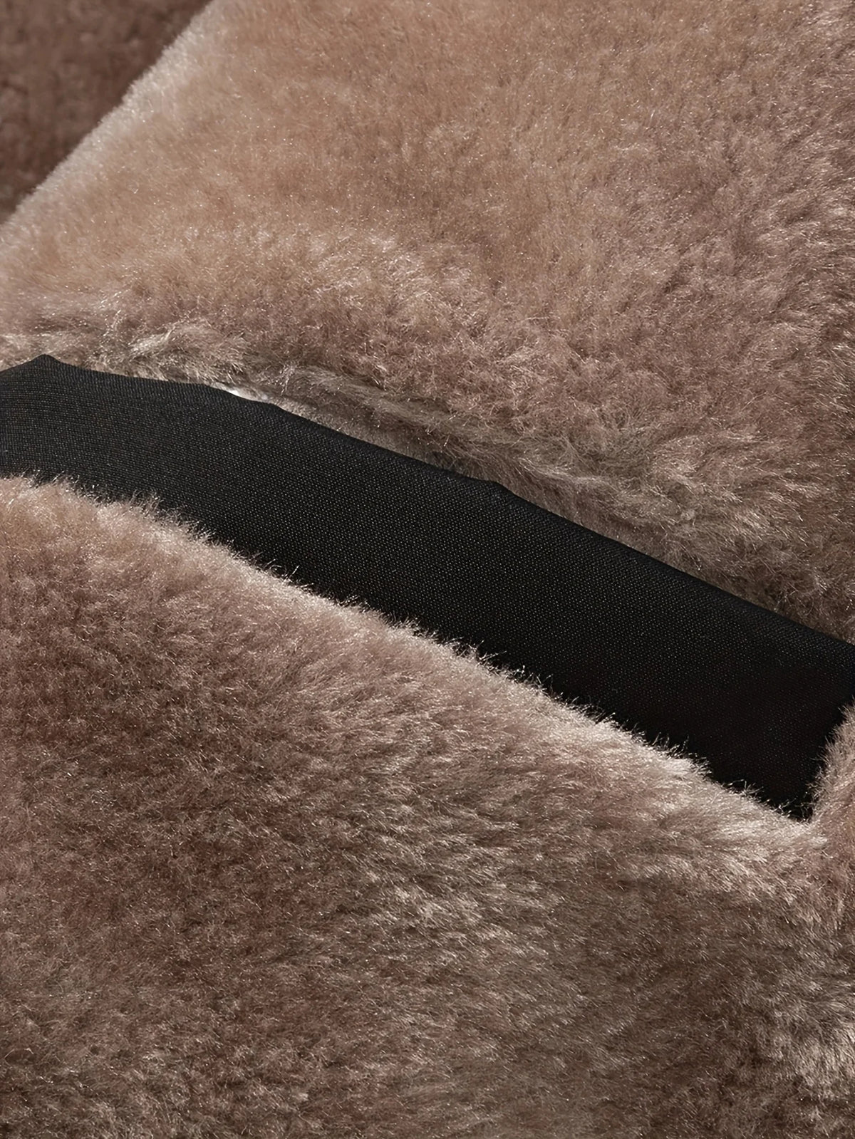 Men's black sherpa-lined hooded winter coat, collar open