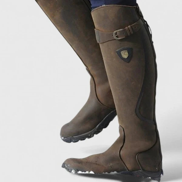 Women's black supportive buckled ankle boots, with an adjustable strap