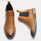 Men's black refined chelsea boots with sleek elastic side panels