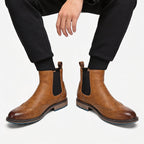 Men's dark brown refined chelsea boots with sleek elastic side panels