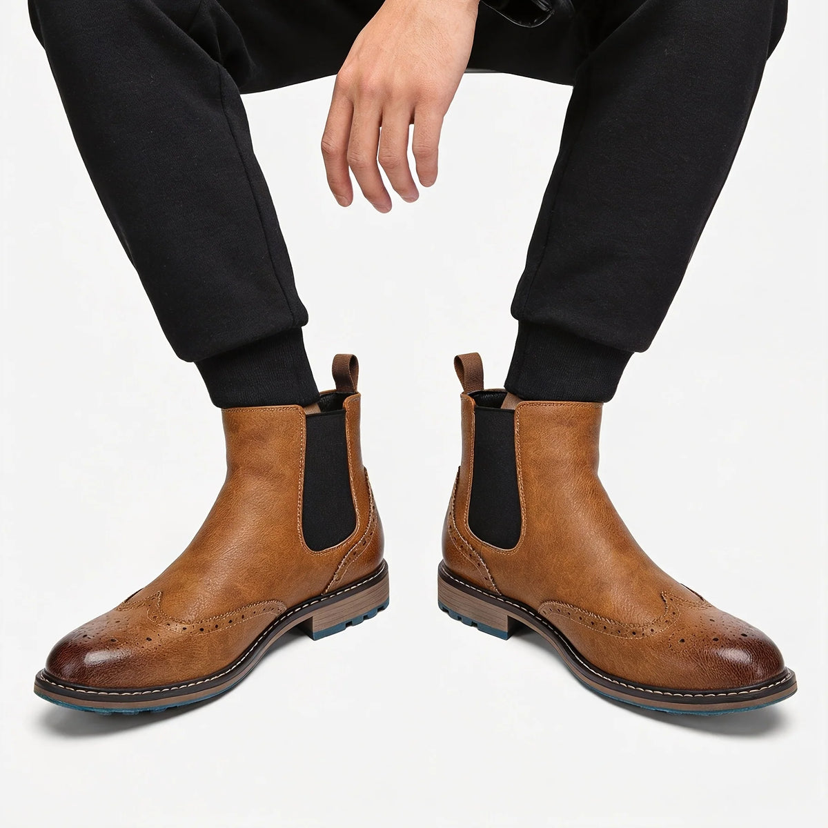 Men's dark brown refined chelsea boots with sleek elastic side panels