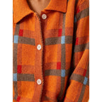 Women's orange plaid button-front cardigan with patch pockets