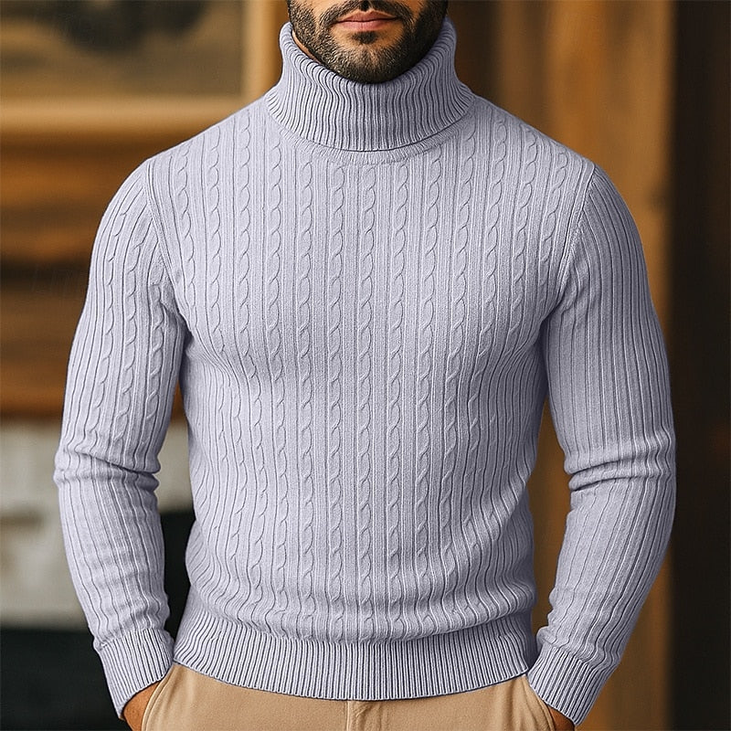 Men's gray chunky cable knit turtleneck sweater with raglan sleeves