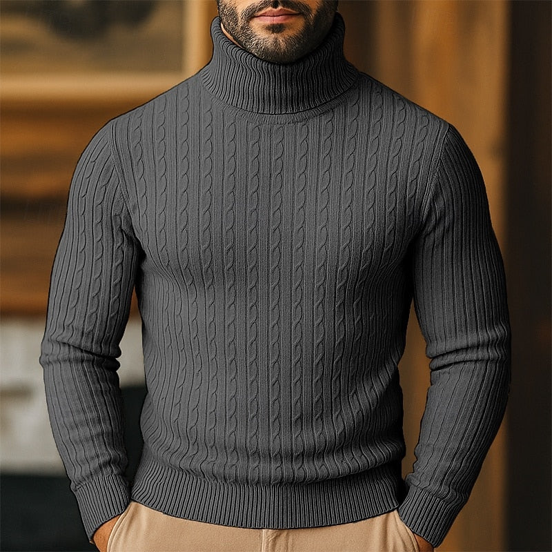 Men's dark gray chunky cable knit turtleneck sweater with raglan sleeves