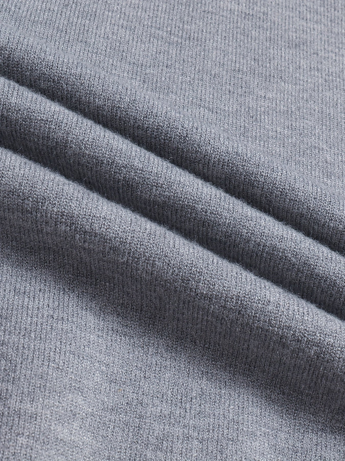 Men's flecked gray ribbed knit fabric close-up, mock-neck sweater