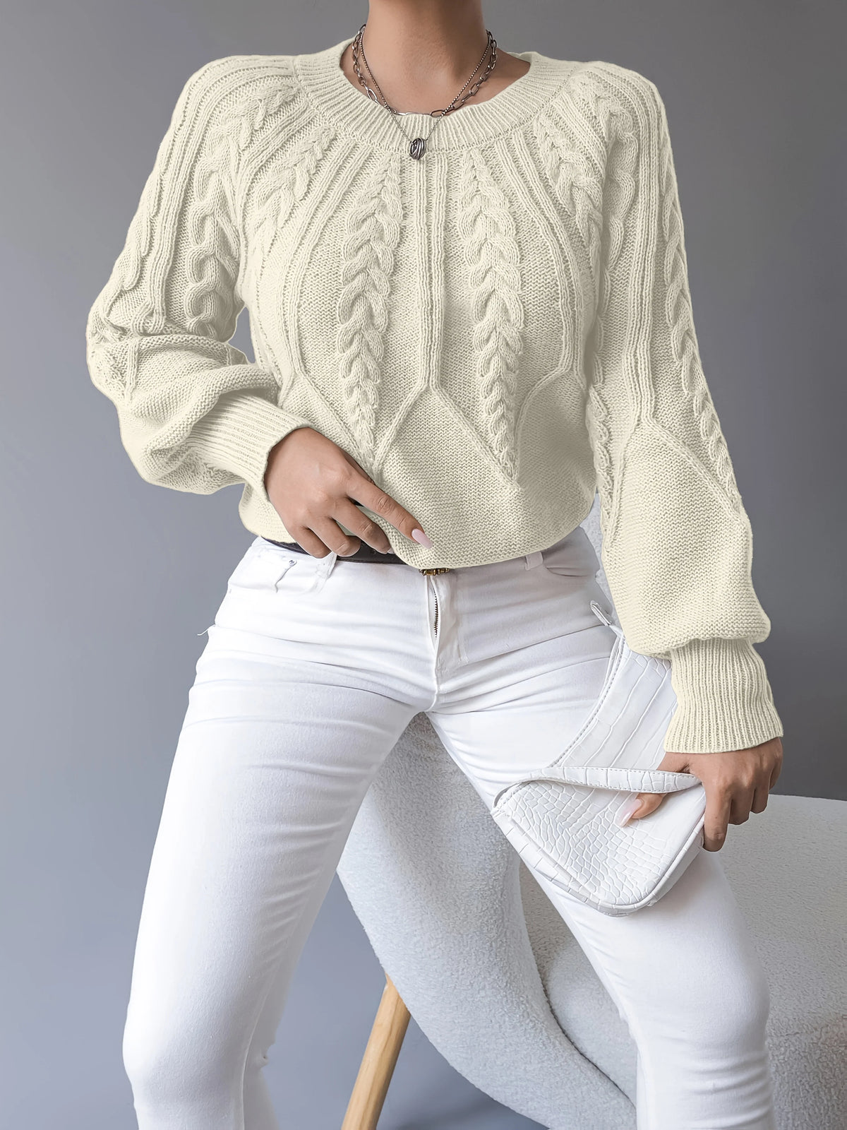 Women's black cable knit lantern sleeve sweater