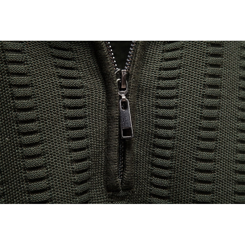 Men's army green half-zip sweater, close-up of zip pull