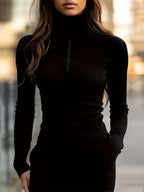 Women's black ribbed half-zip mock neck top, fitted knit