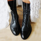 Women's black classic lace-up ankle boots, with eyelet lacing