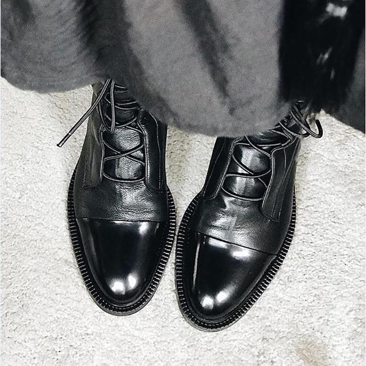 Women's black classic lace-up ankle boots, with eyelet lacing