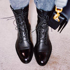 Women's black classic lace-up ankle boots, with eyelet lacing