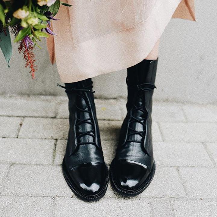 Women's black classic lace-up ankle boots, with eyelet lacing
