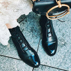 Women's black classic lace-up ankle boots, with eyelet lacing