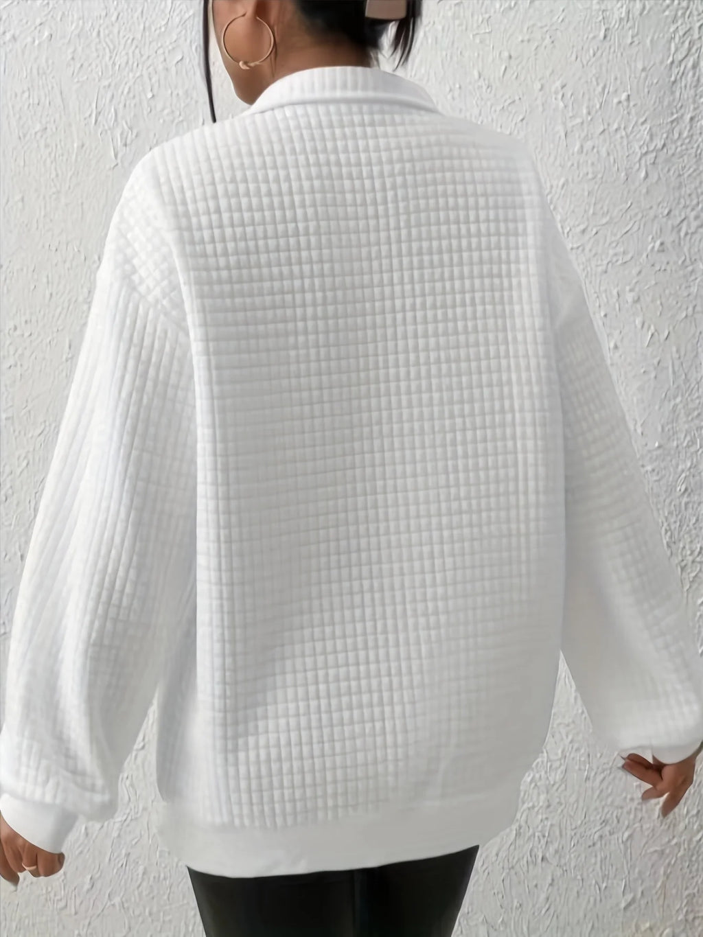 Women's light green relaxed-fit quarter-zip sweater with ribbed hem