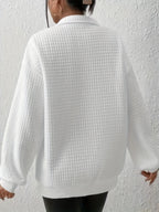 Women's light green relaxed-fit quarter-zip sweater with ribbed hem