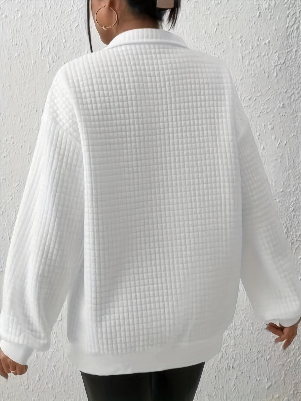 Women's light green relaxed-fit quarter-zip sweater with ribbed hem